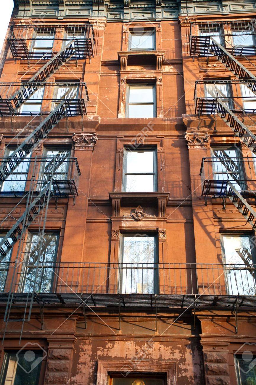 Brick Apartment Building Window old brick apartment buildings in a big city. stock photo, picture Brick Apartment Building Window old brick apartment buildings in a big city. stock photo, picture