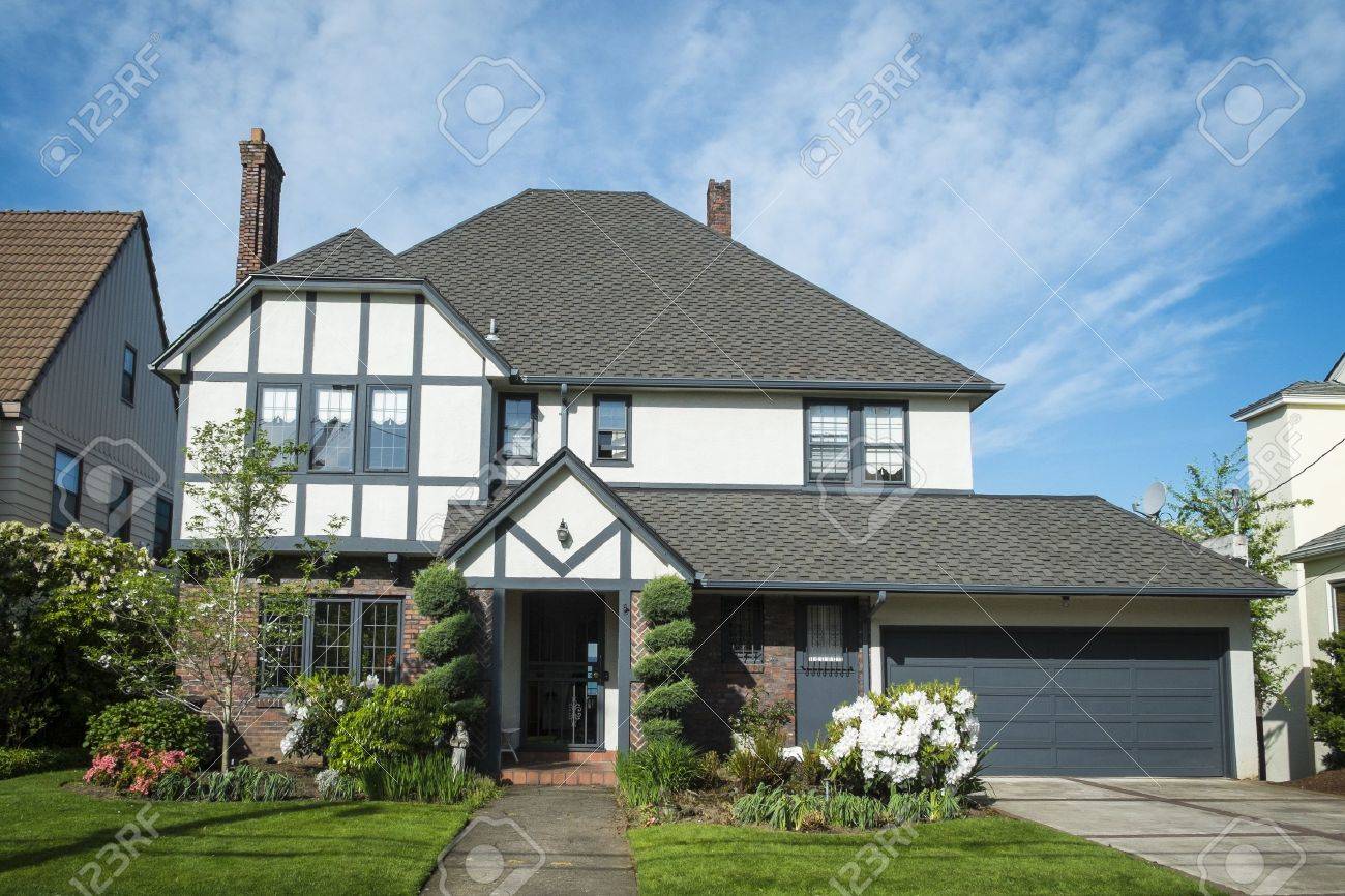 classic american suburban house with blue sky background stock photo