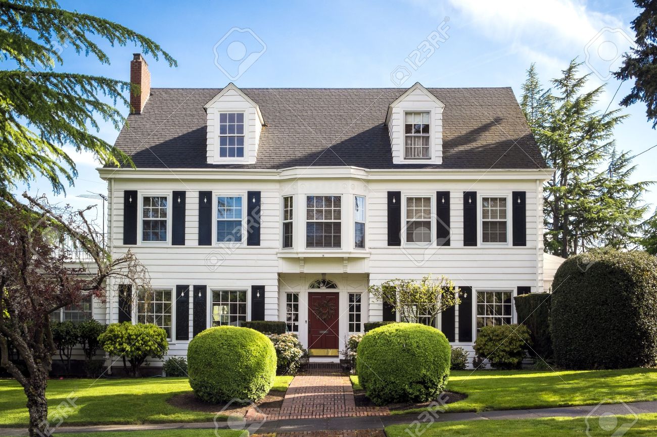 classic american suburban house with blue sky background stock photo