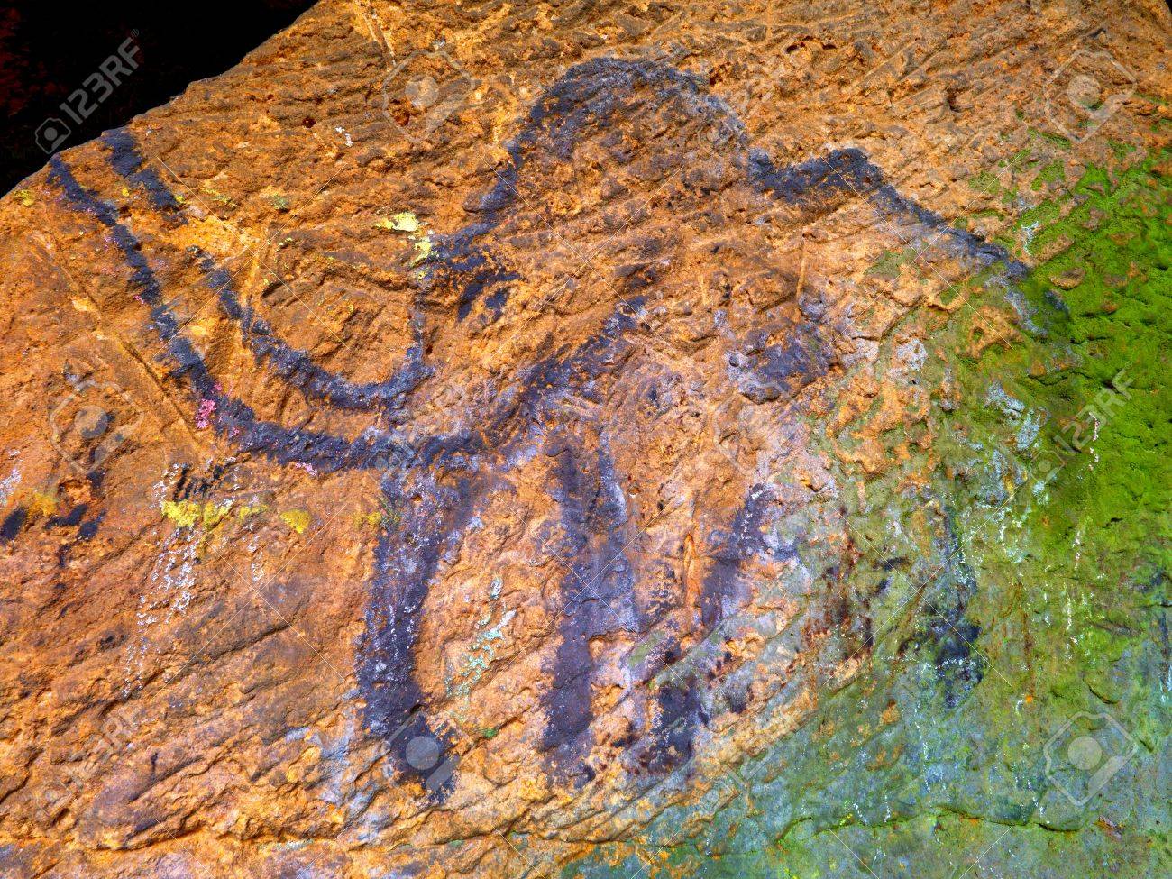 prehistoric art of mammoth in sandstone cave spotlight shines prehistoric art
