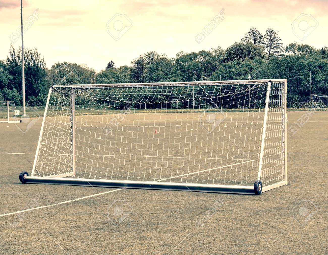 Behind goal net Clearance