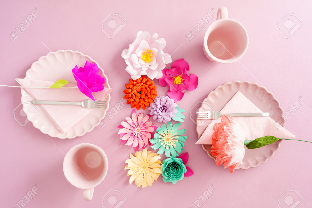 light table decoration with paper flowers and place settings stock paper flower table decorations