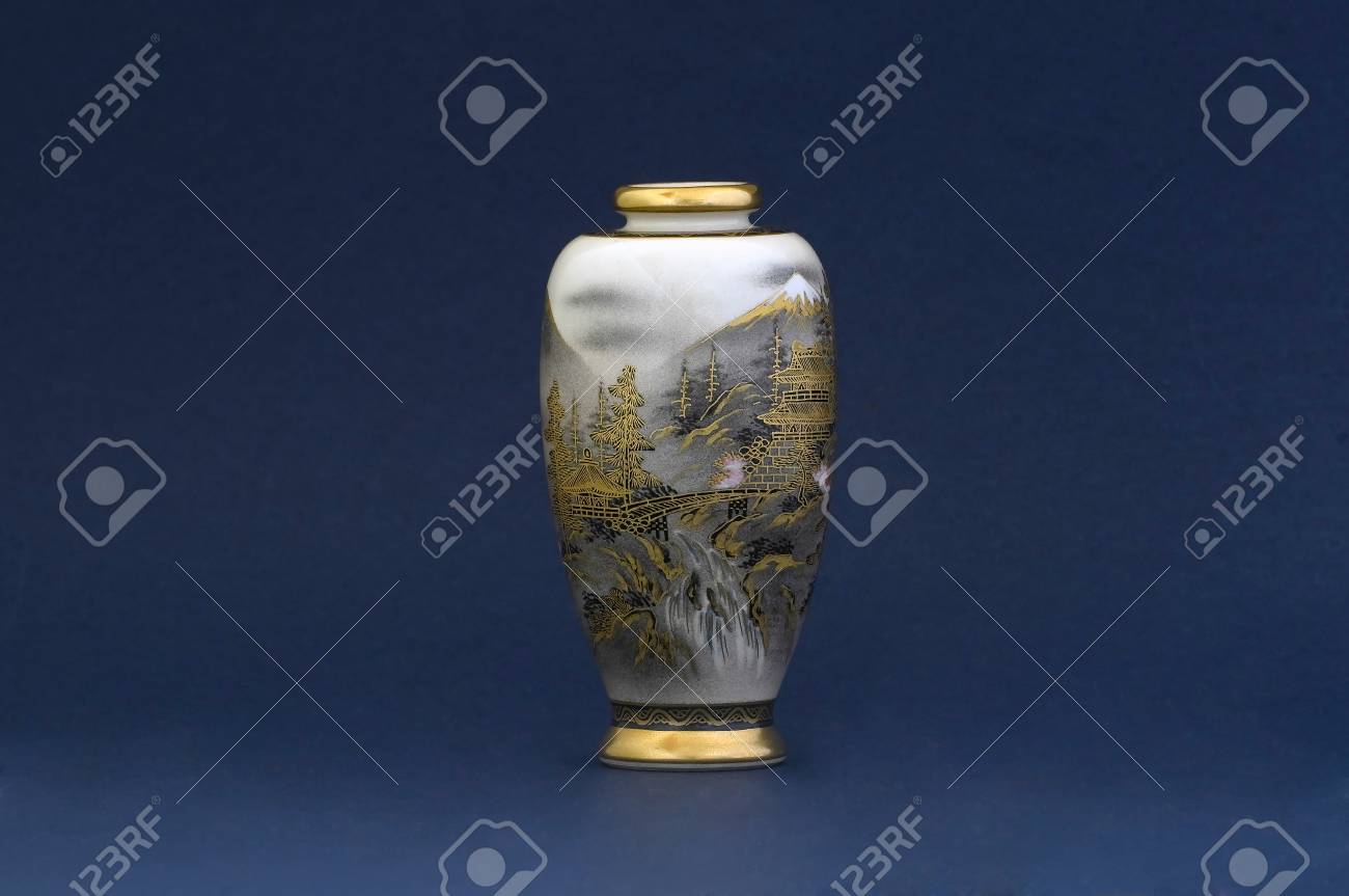 A japanese vase on blue background - 32558776 A japanese vase on blue background - 32558776