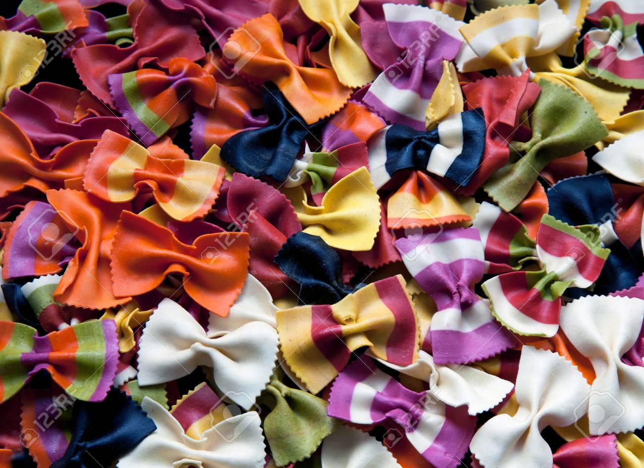 Background of multicolor italian bowtie farfalle pasta - 34321591 Background of multicolor italian bowtie farfalle pasta - 34321591