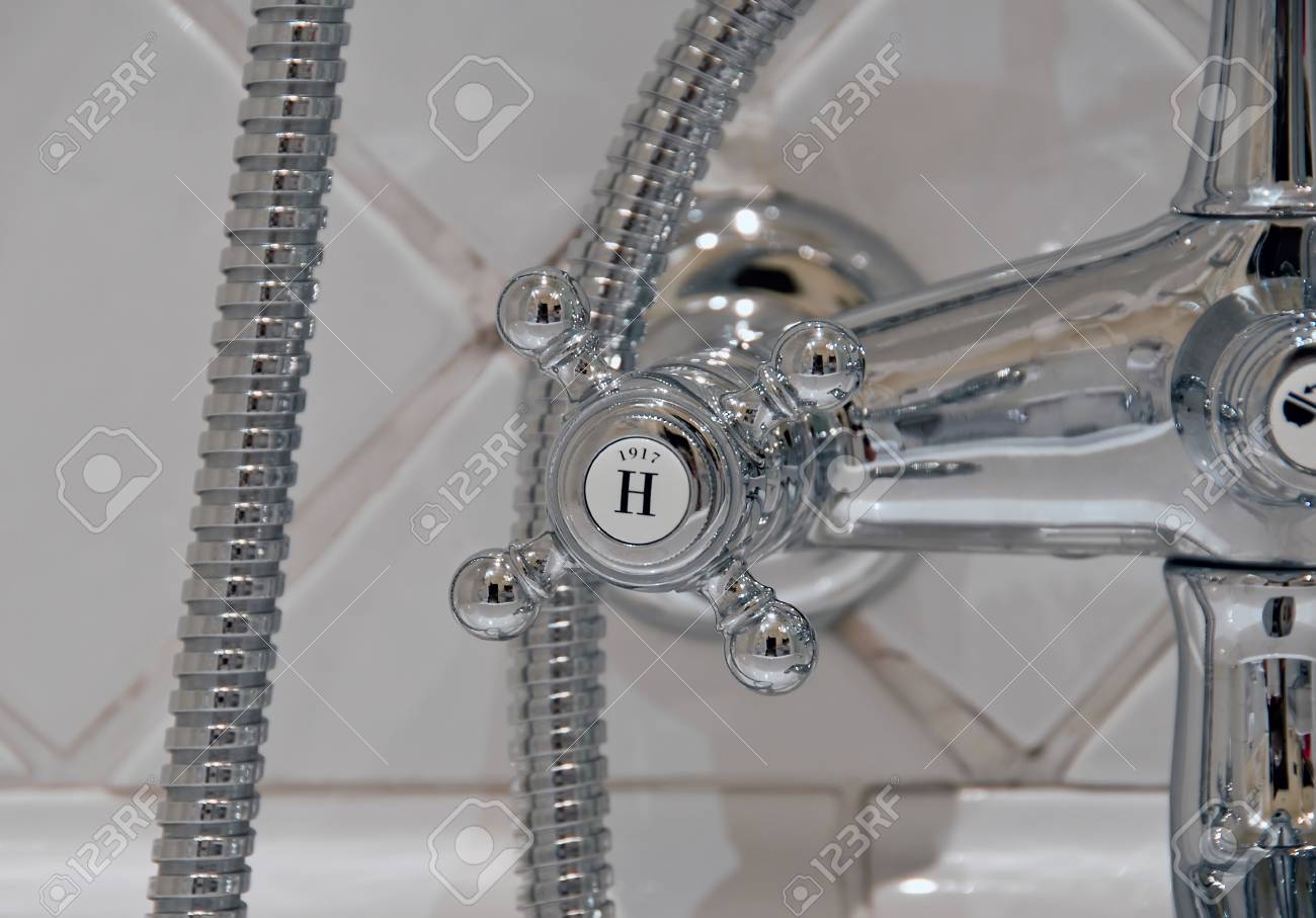 detail of a vintage victorian chrome hot water tap - 39039362 detail of a vintage victorian chrome hot water tap - 39039362