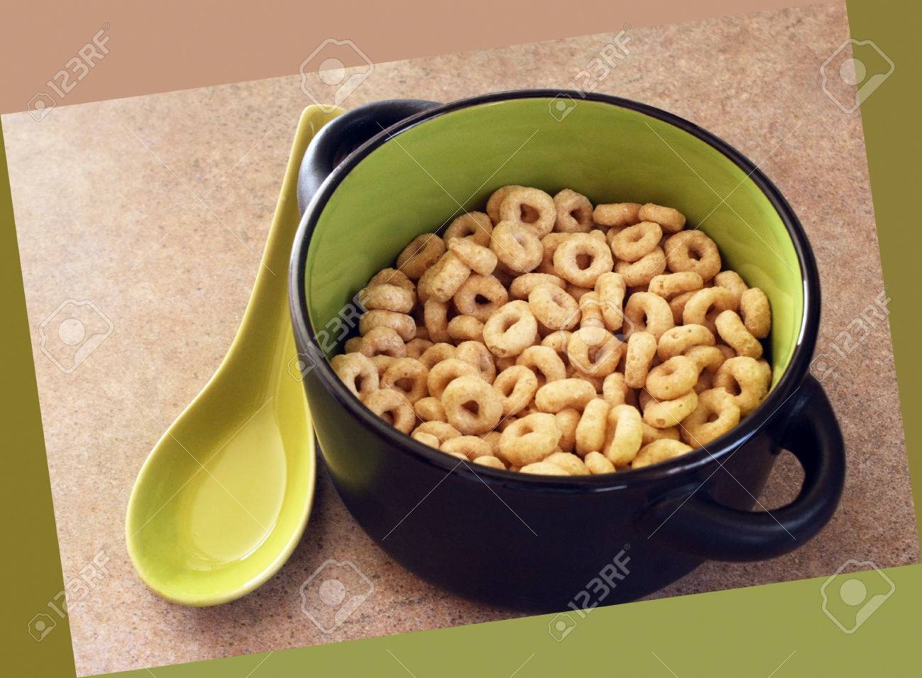 bowl of cheerios breakfast cereal without milk stock photo picture