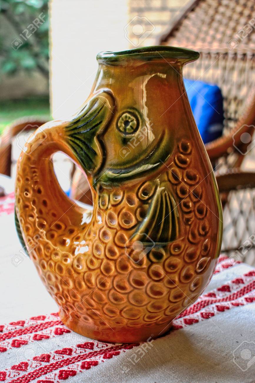 Fish Shaped Water Pitcher On A Table Stock Photo Picture And