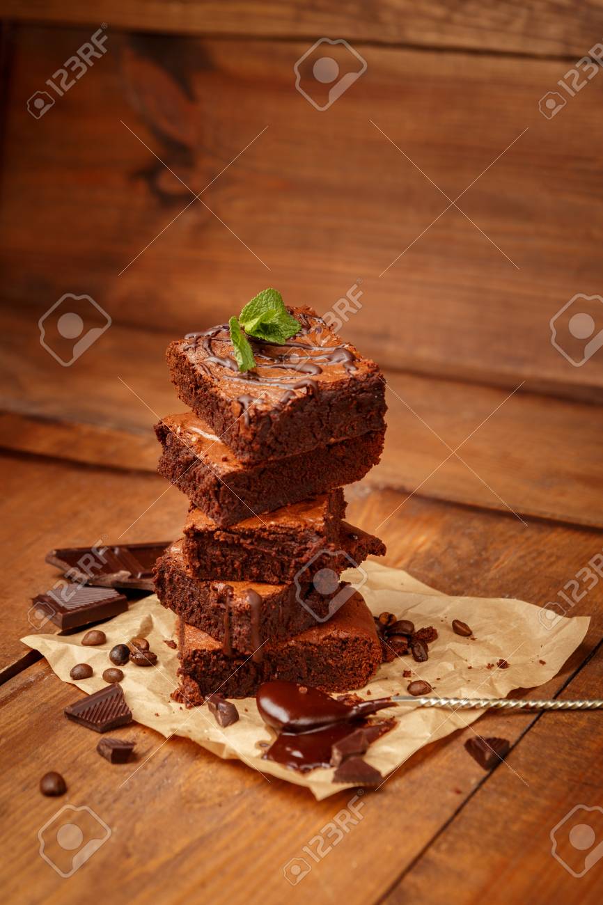 Plate with delicious chocolate brownies on dark vintage wood background. - 52348648 Plate with delicious chocolate brownies on dark vintage wood background. - 52348648