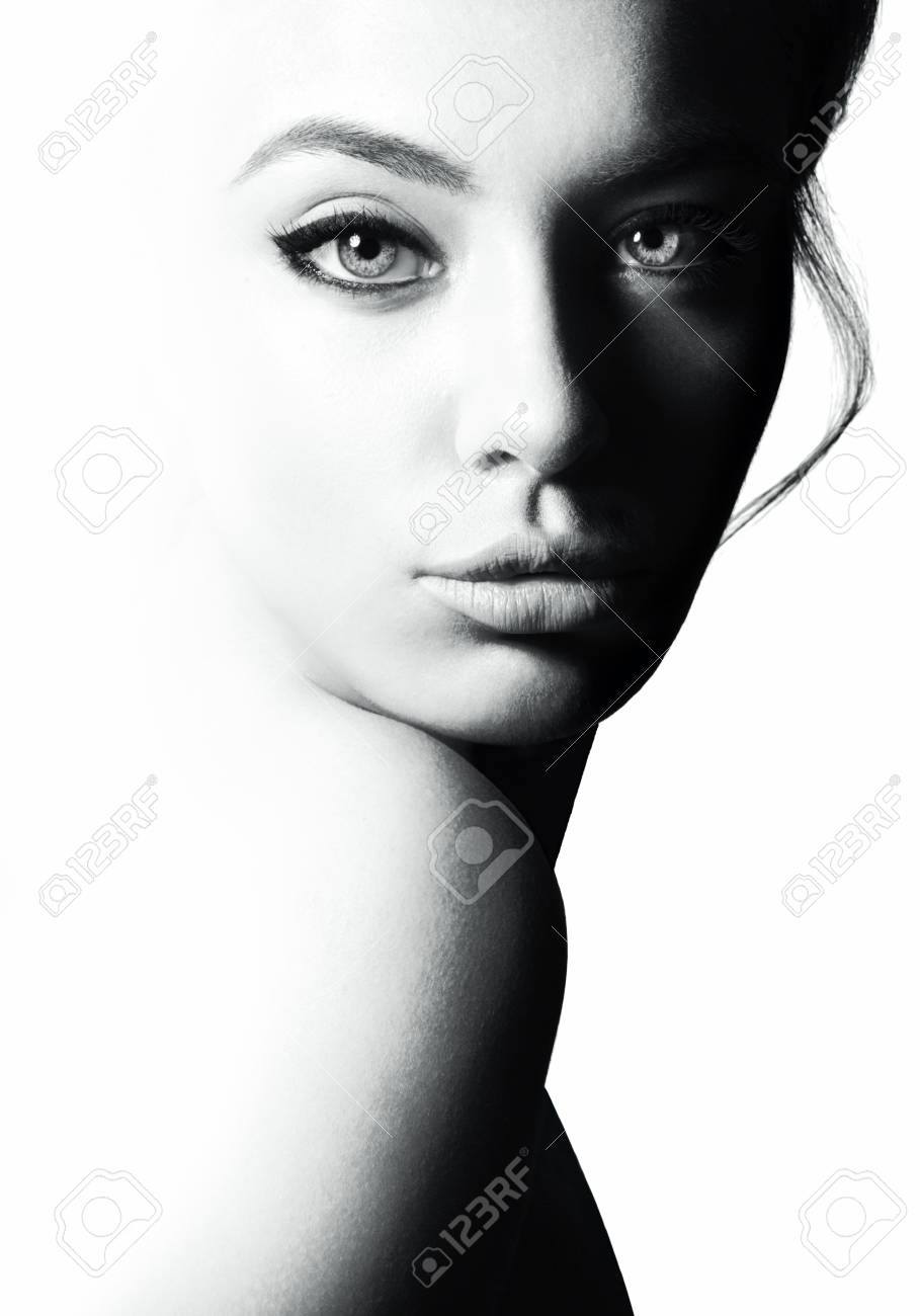 High contrast black and white portrait of a beautiful girl stock photo 91087764