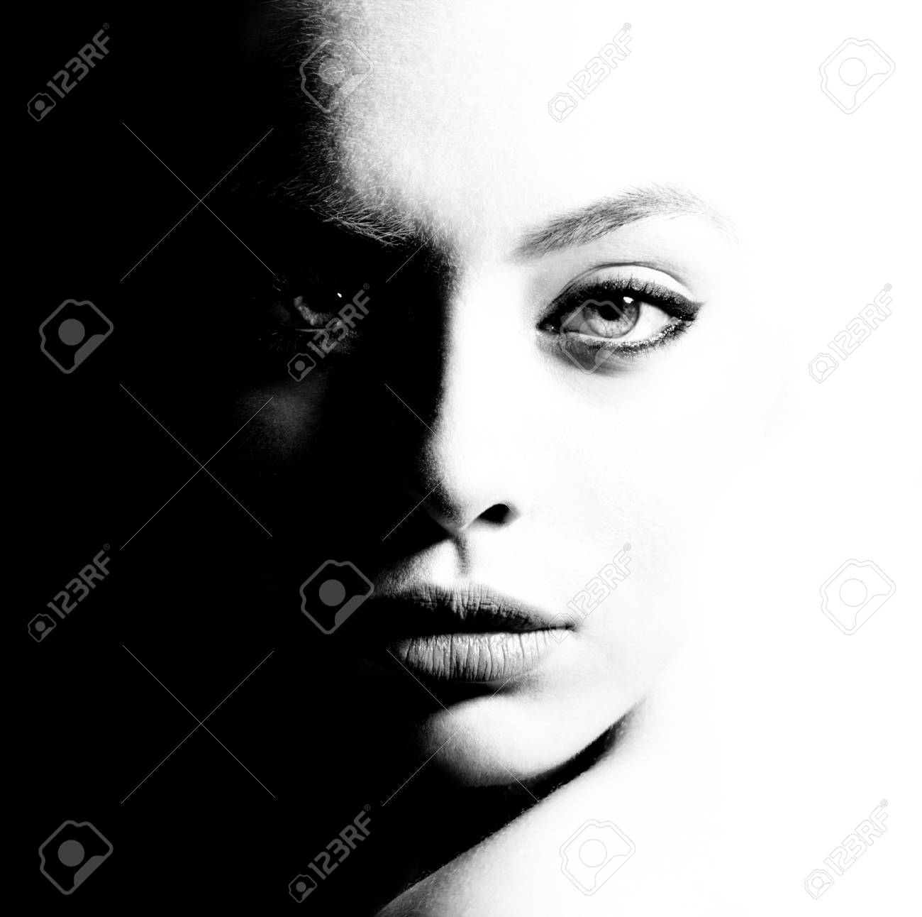 High contrast black and white portrait of a beautiful girl stock photo 101039137