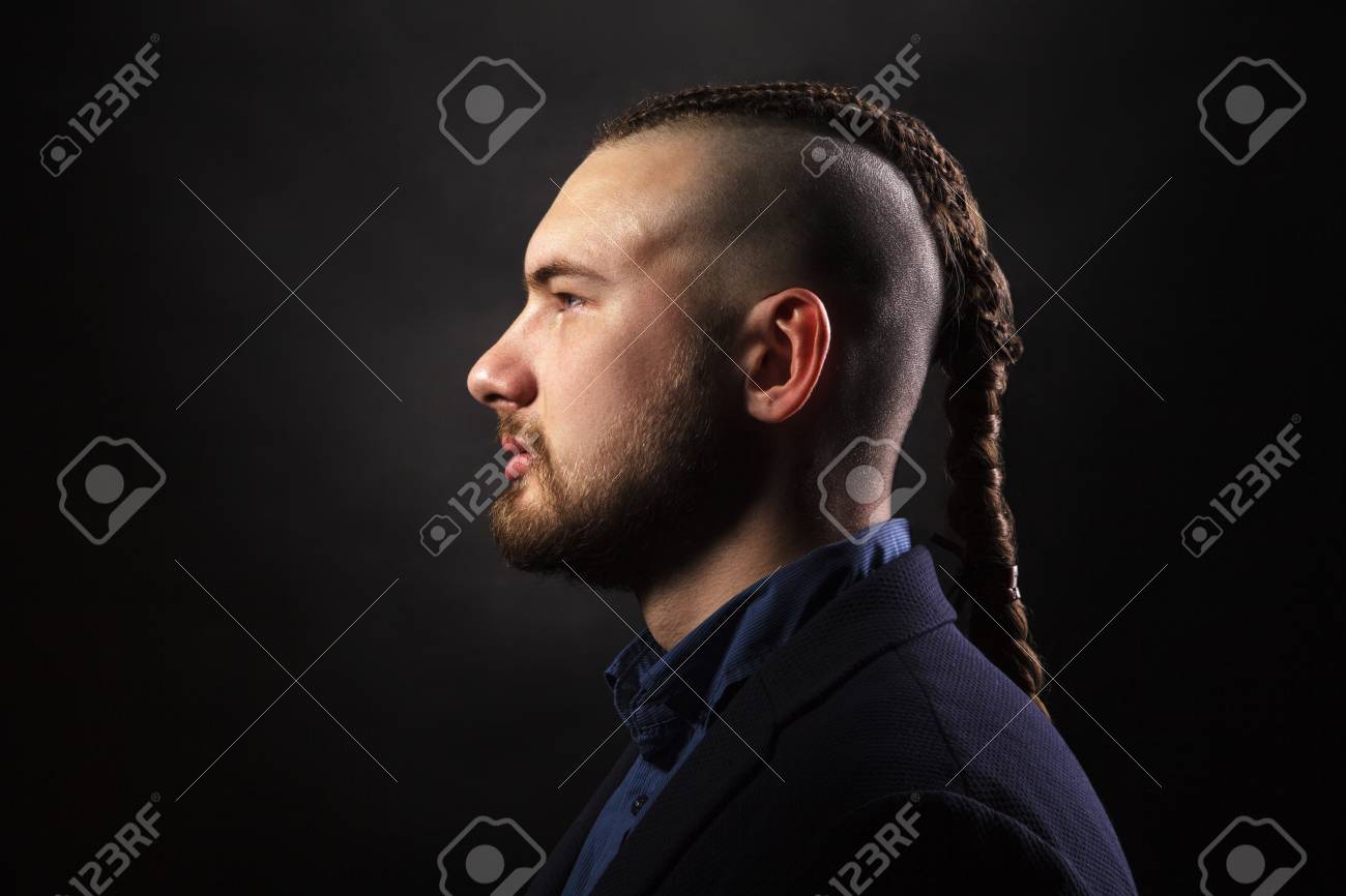 Man With Dreadlocks, Looks Like A Viking, Iroquois Haircut Stock Photo, Picture And Royalty Free Image. Image 101594122. Man With Dreadlocks, Looks Like A Viking, Iroquois Haircut Stock Photo, Picture And Royalty Free Image. Image 101594122.