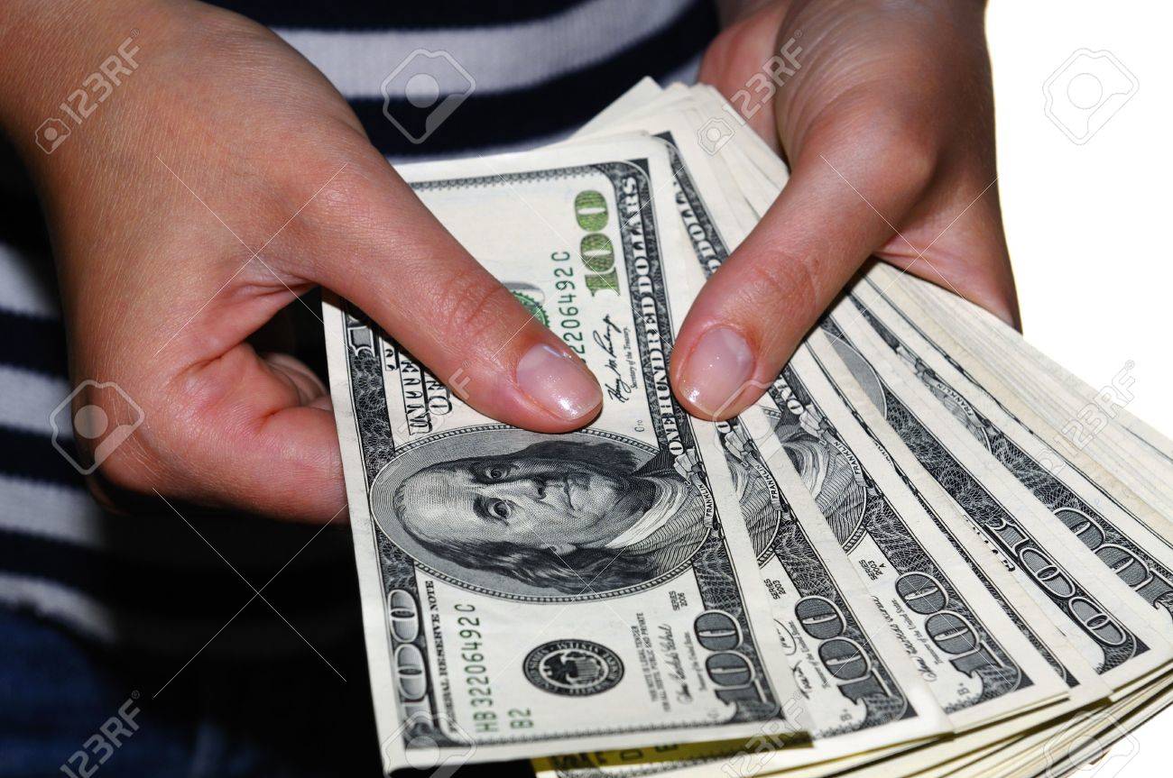 worksheet Counting Dollar Bills womans hand counting hundred dollar bills stock photo picture 3519598