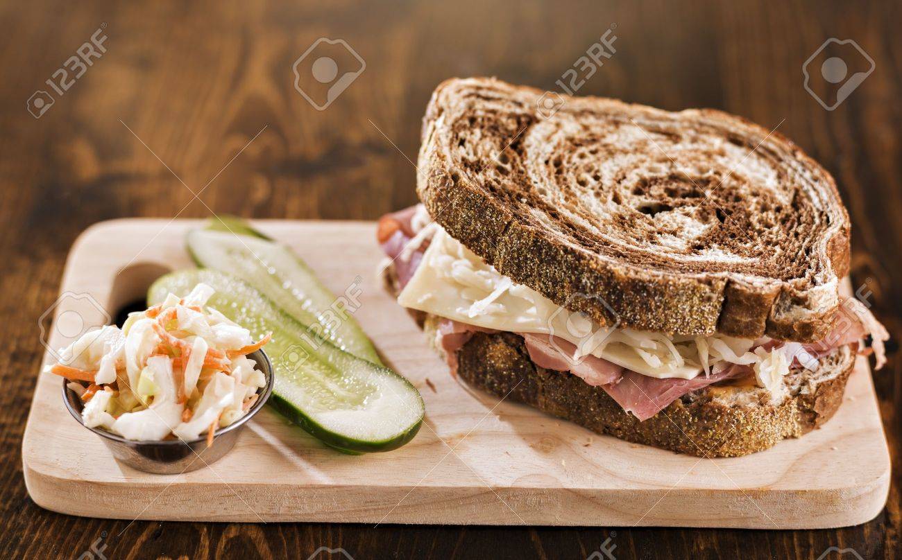 reuben sandwich with kosher dill pickle and coleslaw - 19798495 reuben sandwich with kosher dill pickle and coleslaw - 19798495