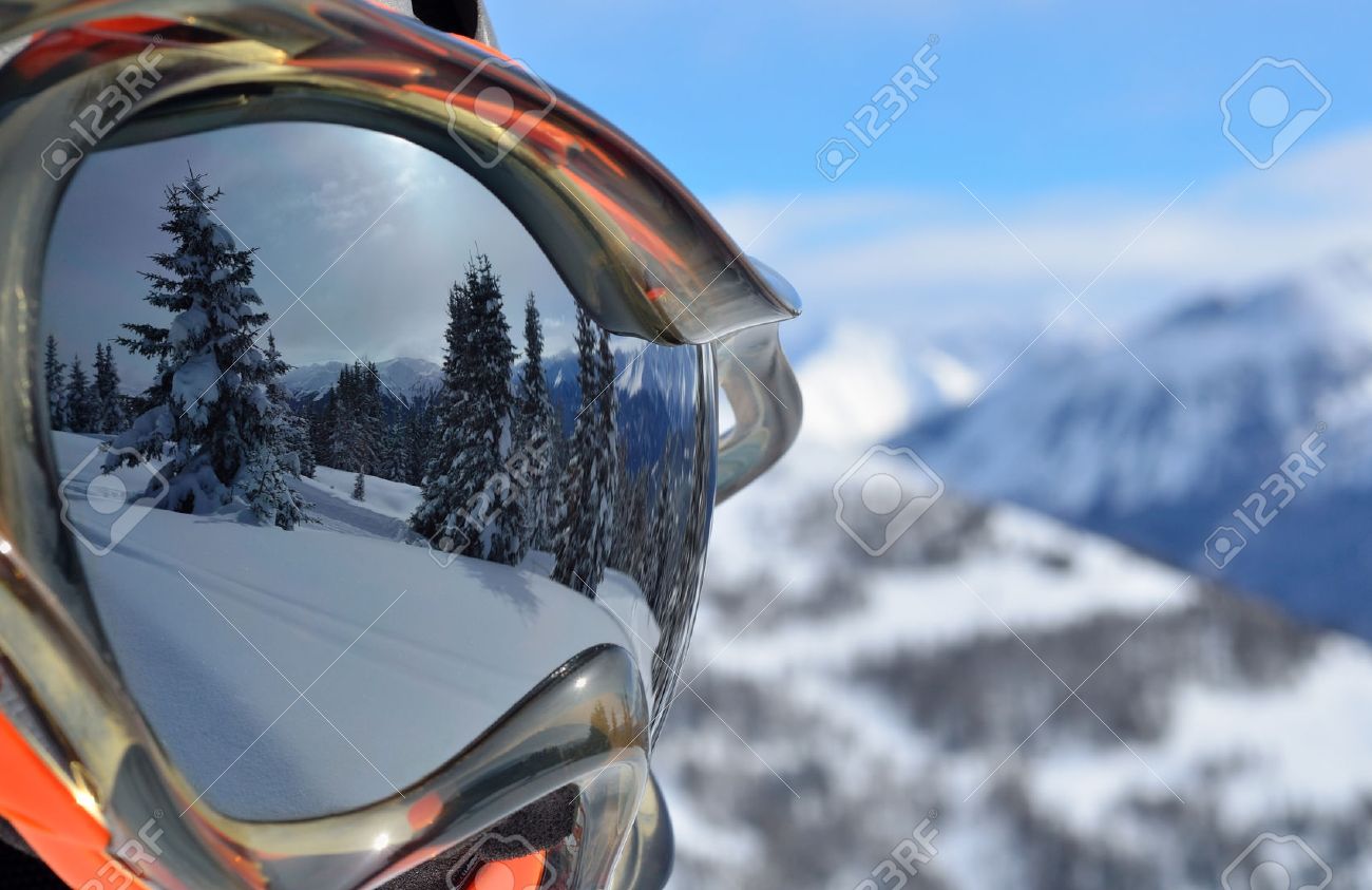 Reflection of the winter mountain landscape in a ski mask - 24748177 Reflection of the winter mountain landscape in a ski mask - 24748177