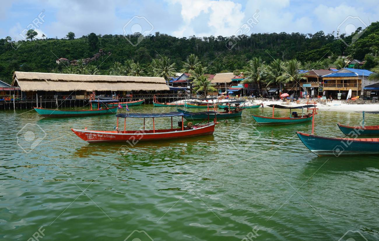 KOH RONG ISLAND, CAMBODIA - JULY 27, 2015: Village view with traditional khmer boats on the beach of Koh Rong Island near Sihanoukville, Gulf of Thailand, Cambodia - 72821627 KOH RONG ISLAND, CAMBODIA - JULY 27, 2015: Village view with traditional khmer boats on the beach of Koh Rong Island near Sihanoukville, Gulf of Thailand, Cambodia - 72821627