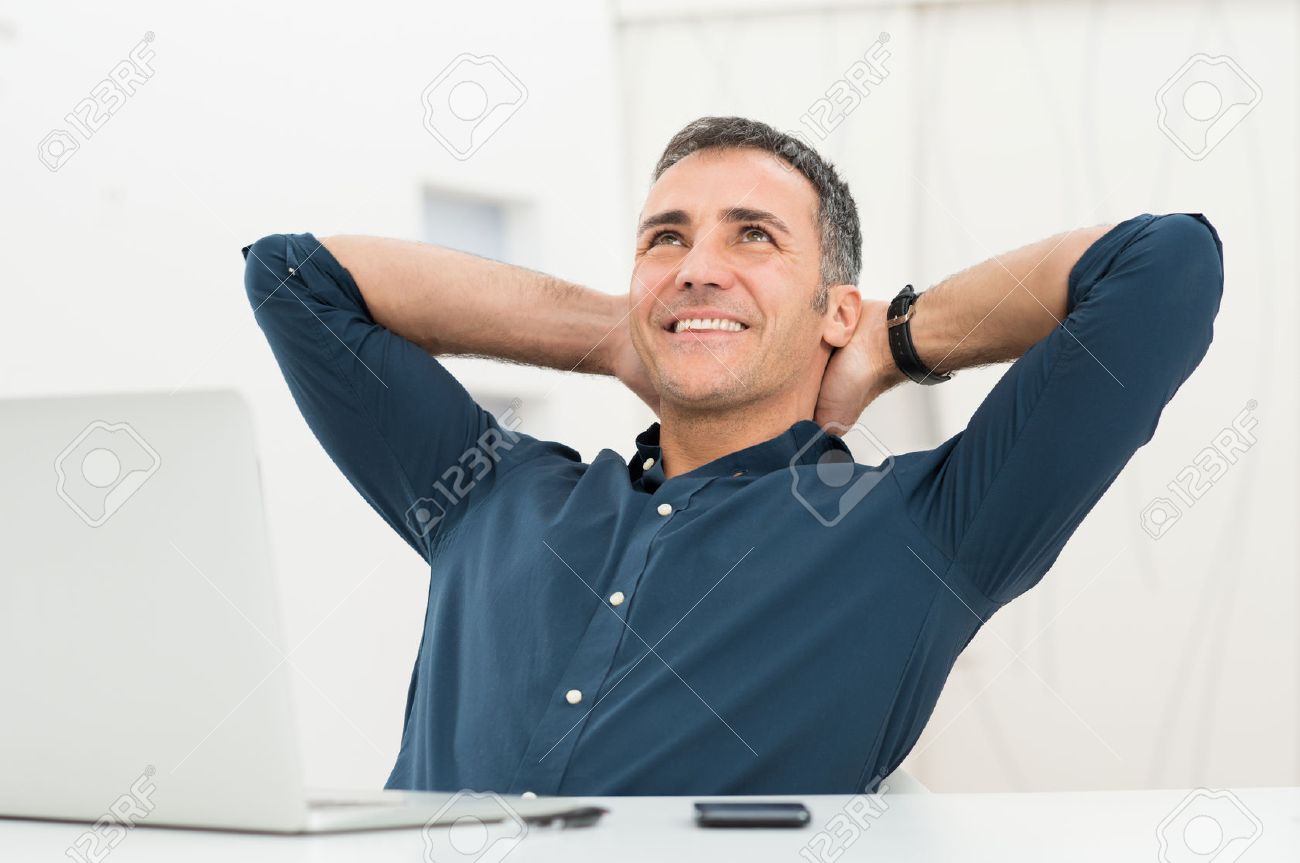 Mature Man Satisfied Sitting In Front Of Laptop Daydreaming Stock Photo,  Picture And Royalty Free Image. Image 25271763.