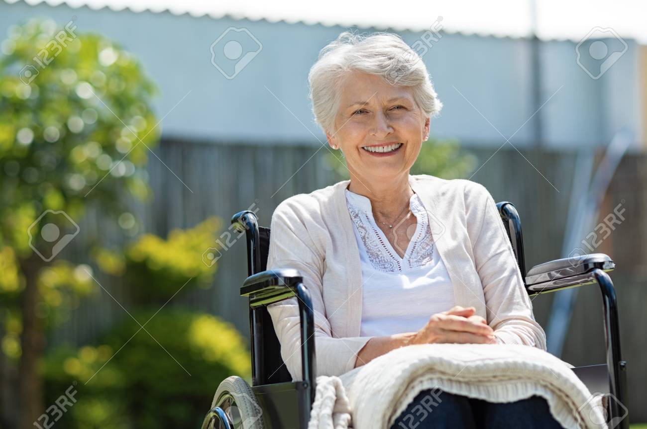 Senior Woman Sitting On Wheelchair