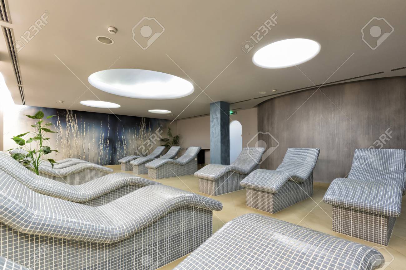 heated lounge chairs at spa center stock photo picture and royalty