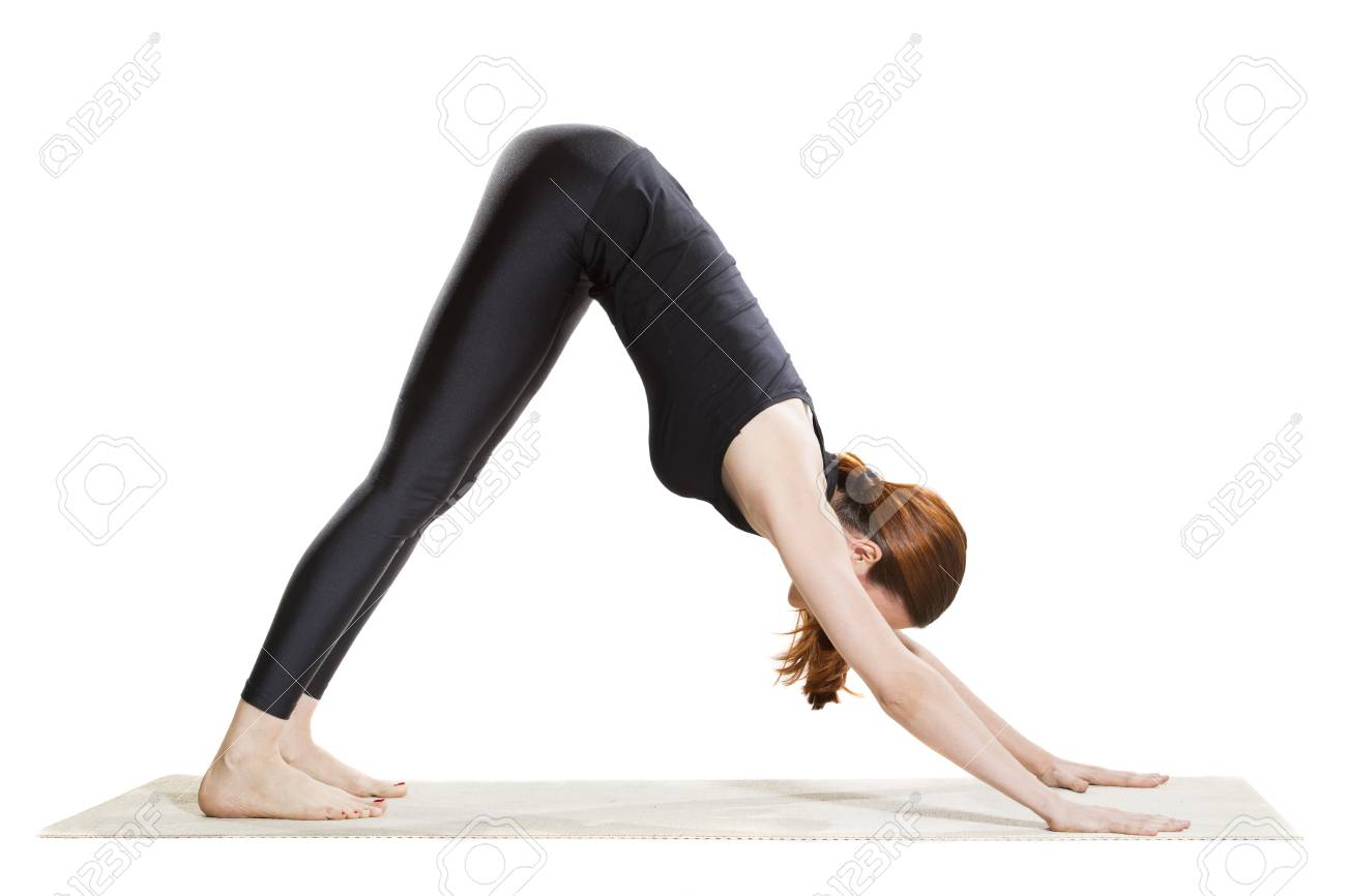 Two young women doing yoga asana double downward dog. Adho mukha svanasana  Stock Photo - Alamy