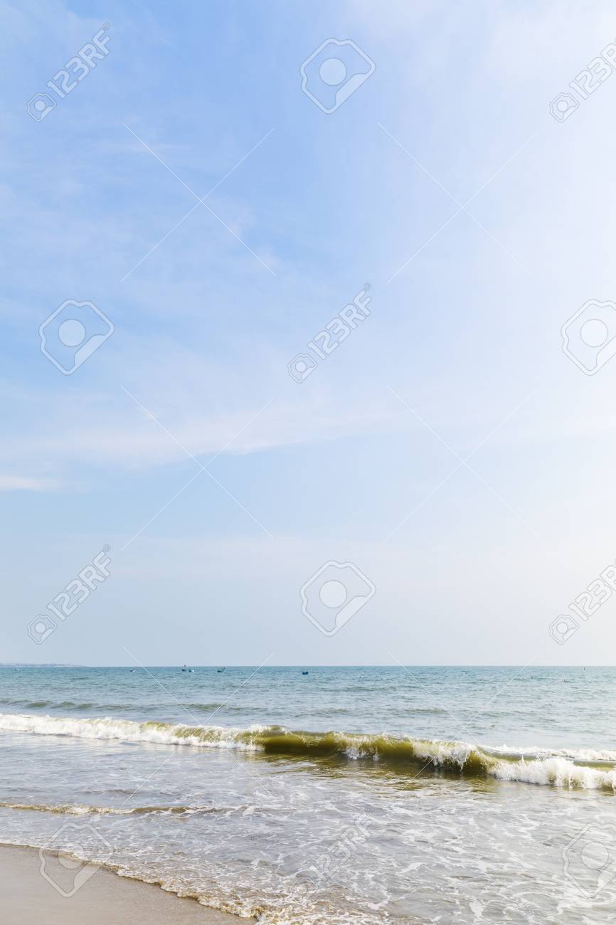 vacation theme background with sandy beach and ocean stock photo ocean theme background
