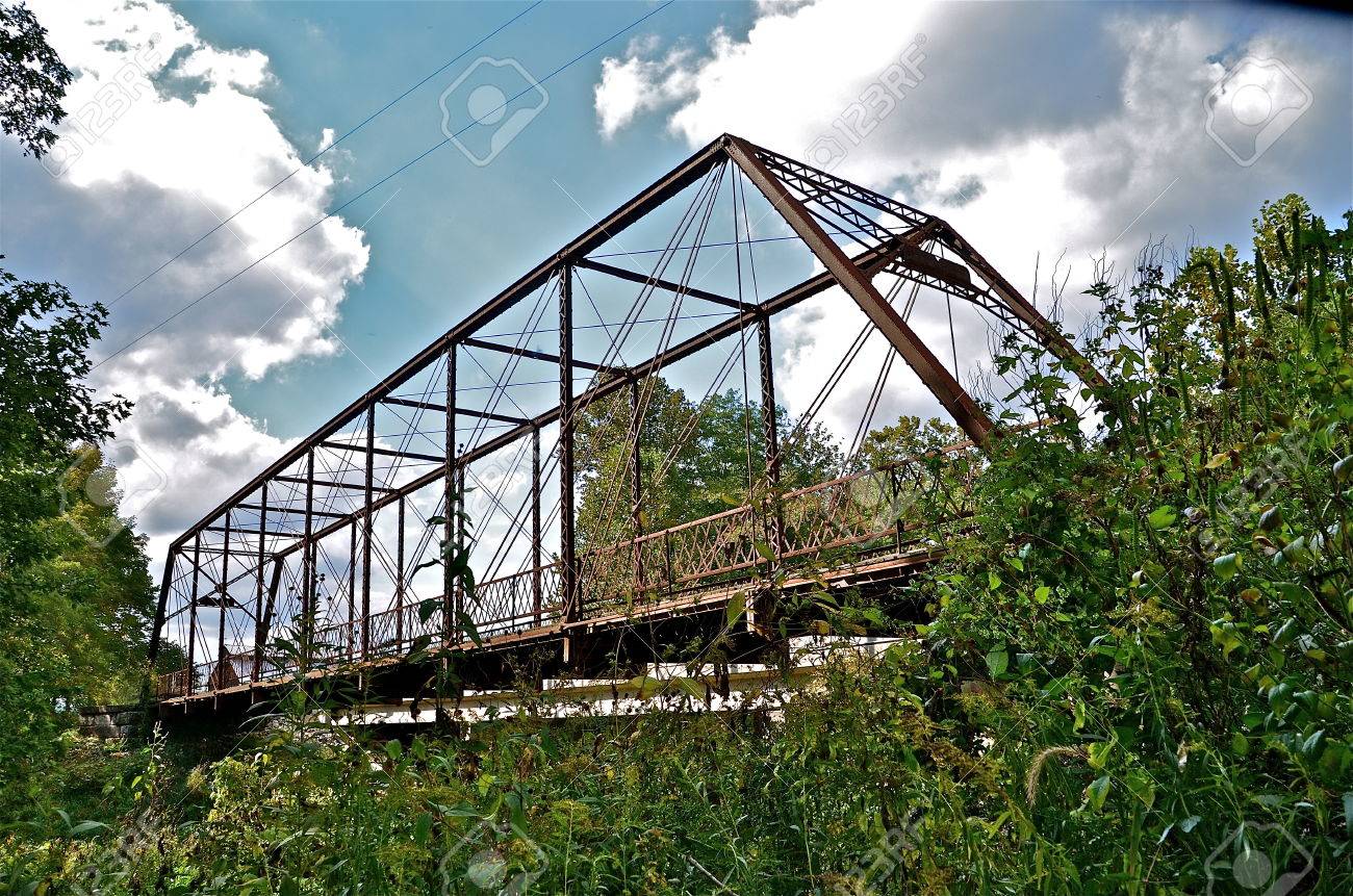 the whipple truss bridge spans the big raccoon river in indiana