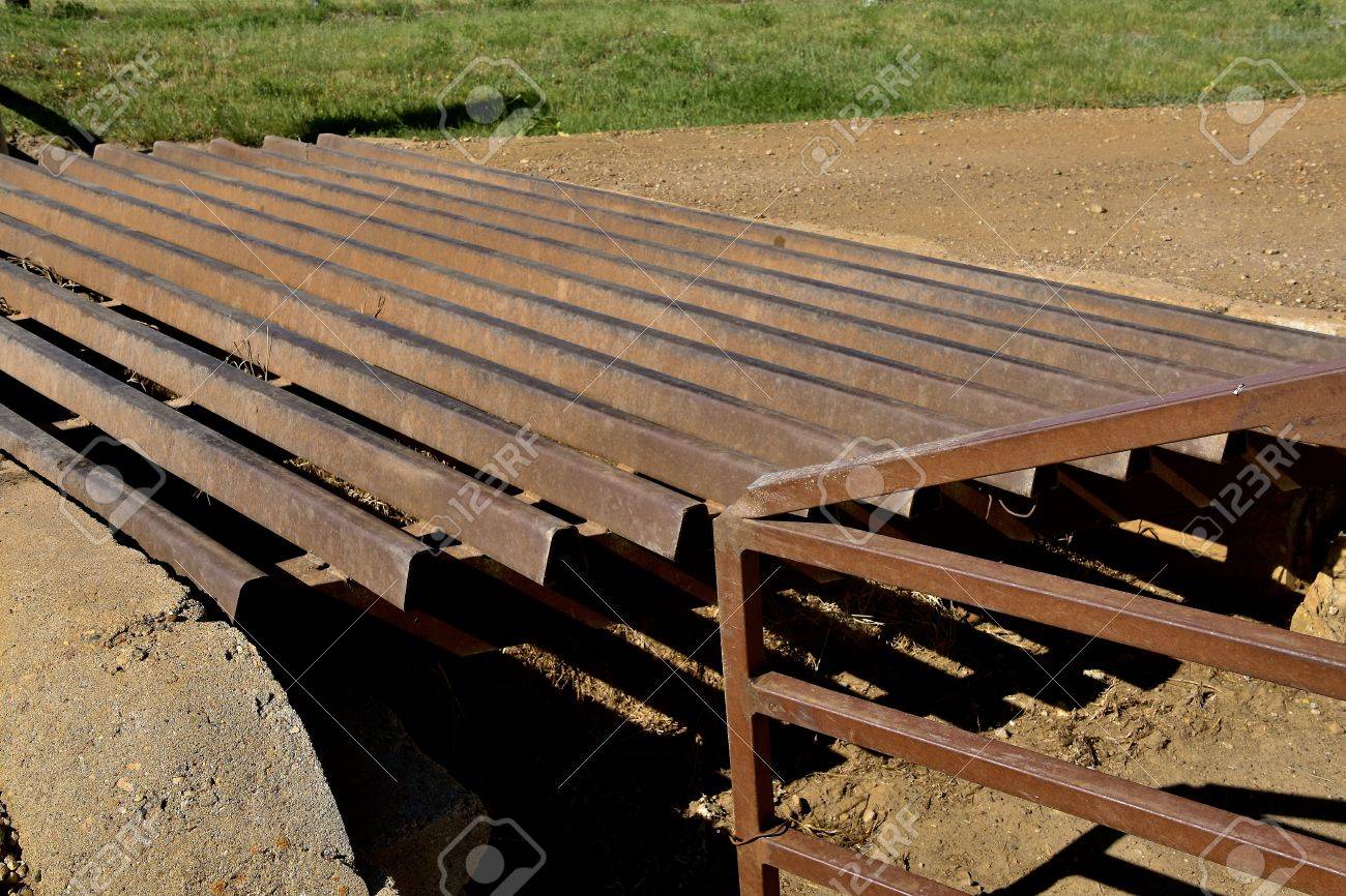 A Closeup Of A Metal Grated Cattle Guard Crossing A Gravel Road Stock Photo Picture And Royalty Free Image Image 81775443
