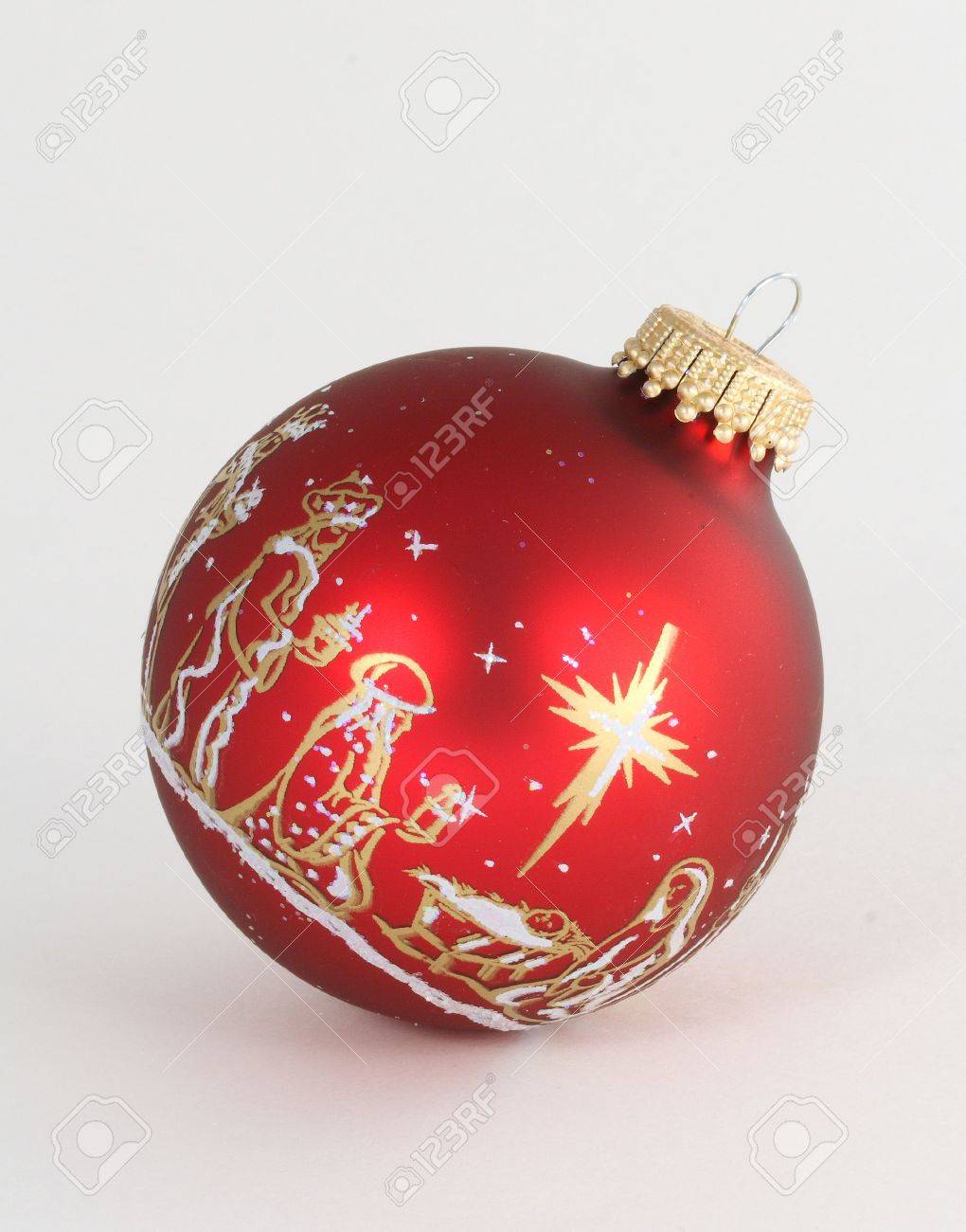 single red ornament depicting nativity scene stock photo picture