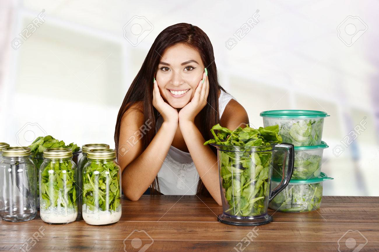 A woman doing meal prep for the week - 43433330 A woman doing meal prep for the week - 43433330