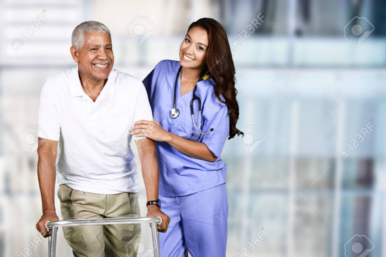 Nurse taking care of an elderly patient - 56307770 Nurse taking care of an elderly patient - 56307770
