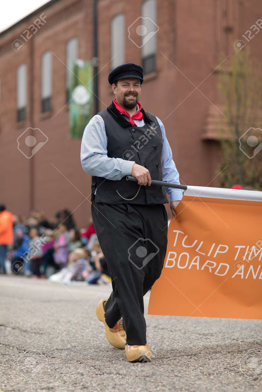 Holland, Michigan, USA - May 12, 2018 Man Wearing Traditional Dutch  Clothing Looks And Smiles At The Camera At The Muziek Parade, During The  Tulip Time Festival Stock Photo, Picture and Royalty