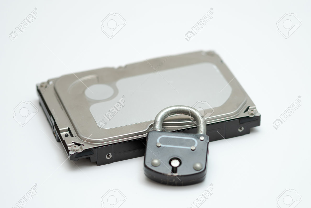 Computer hard disk and metal padlock symbolizing concept for encrypted data, cyber security - 162314752 Computer hard disk and metal padlock symbolizing concept for encrypted data, cyber security - 162314752