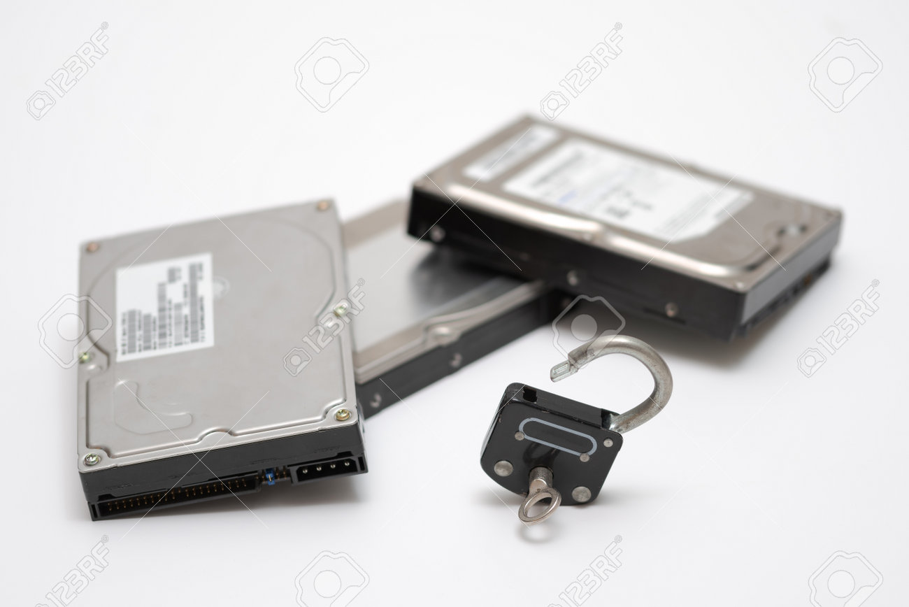 Computer hard disks and open metal padlock symbolizing concept for encrypted data, cyber security on white background - 162314761 Computer hard disks and open metal padlock symbolizing concept for encrypted data, cyber security on white background - 162314761