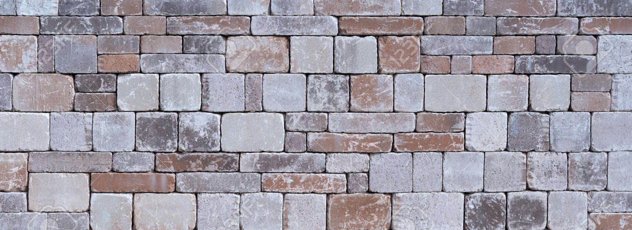 Stone wall made of different square natural stones - 132051369 Stone wall made of different square natural stones - 132051369