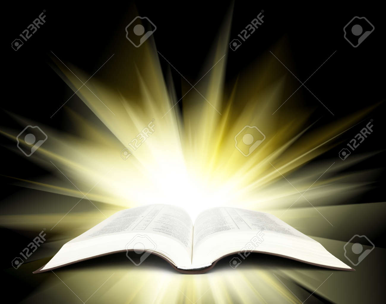 open bible with yellow rays of light stock photo picture and