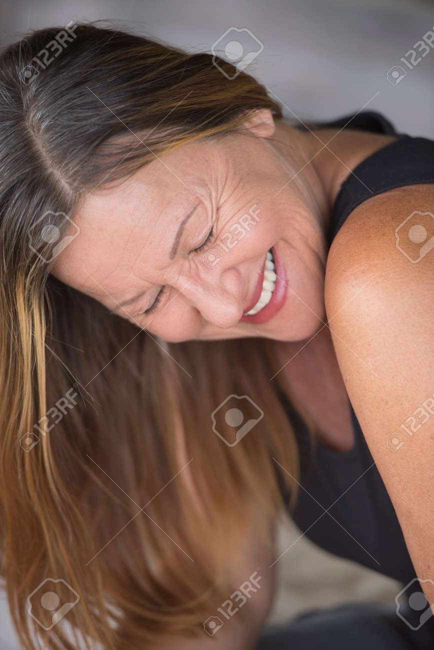 Portrait Attractive Mature Woman Smiling Laughing Joyful Happy Relaxed,  Closed Eyes, Blurred Background. Stock Photo, Picture and Royalty Free  Image. Image 39411604.