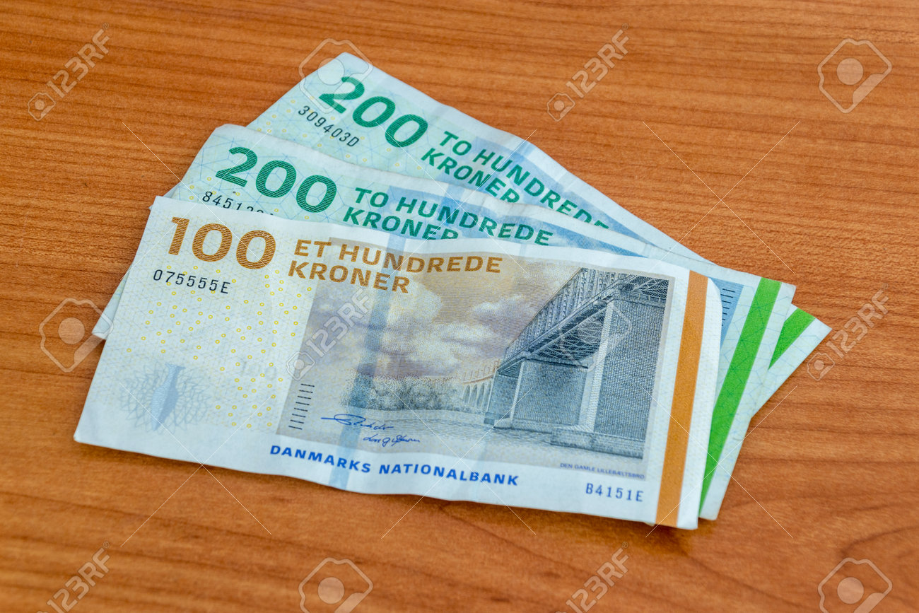 Danish Krone (DKK) Banknotes On Wooden Table. Stock Photo, Picture and  Royalty Free Image. Image 194347720.
