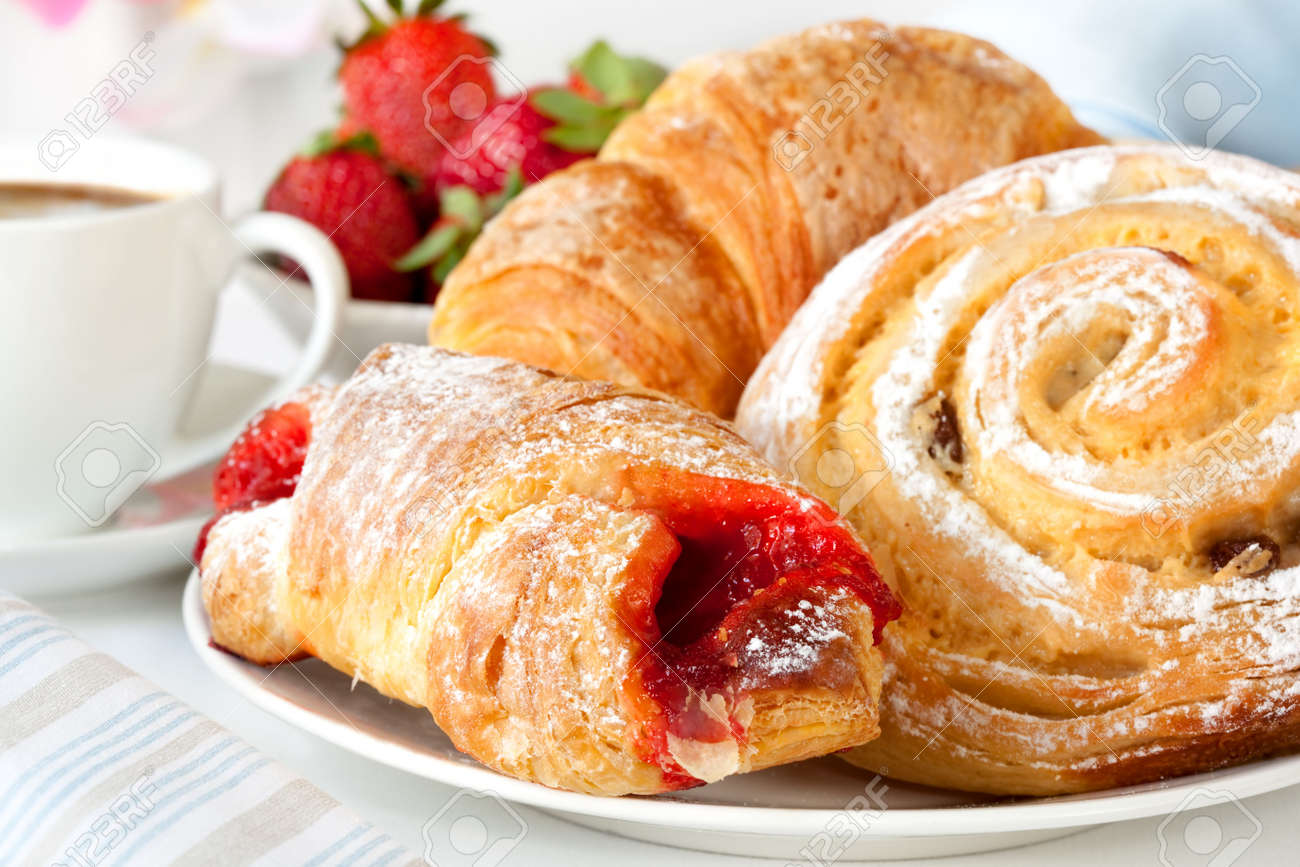 Continental breakfast with assortment of pastries, coffees and fresh strawberries. - 5747071 Continental breakfast with assortment of pastries, coffees and fresh strawberries. - 5747071
