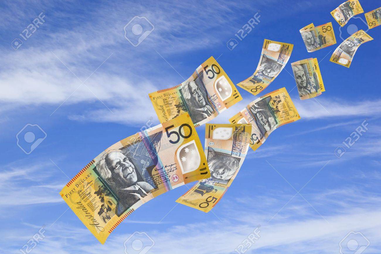 Australian fifty dollar bills falling from a blue sky. - 12420586 Australian fifty dollar bills falling from a blue sky. - 12420586