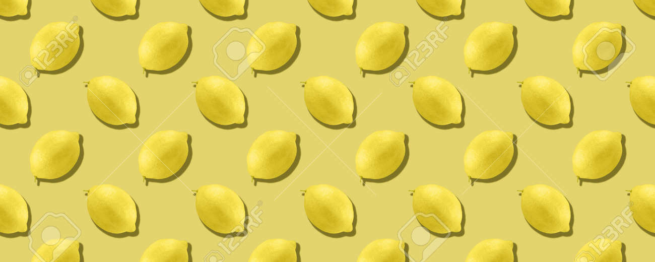 Whole lemon fruit pattern on yellow color background - 167779795 Whole lemon fruit pattern on yellow color background - 167779795