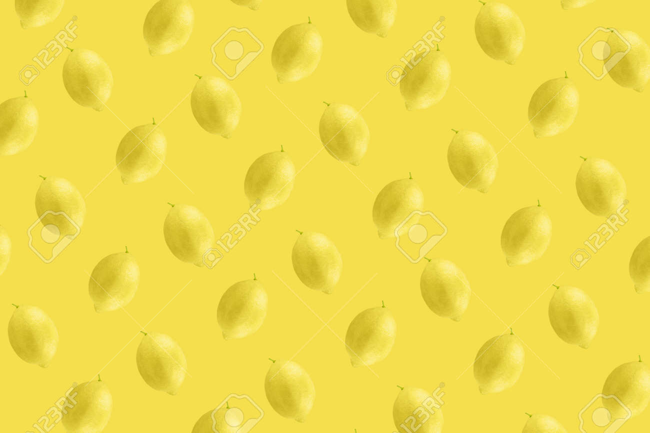 Whole lemon fruit pattern on yellow color background - 167780020 Whole lemon fruit pattern on yellow color background - 167780020