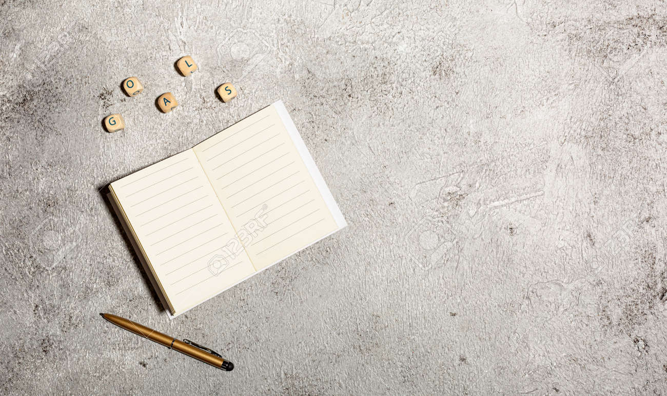 Mockup with open lined notebooks and pen isolated on concrete background - 167780037 Mockup with open lined notebooks and pen isolated on concrete background - 167780037