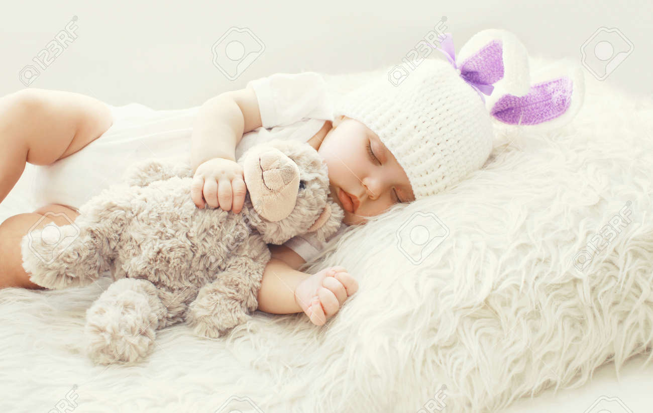 baby and teddy bear
