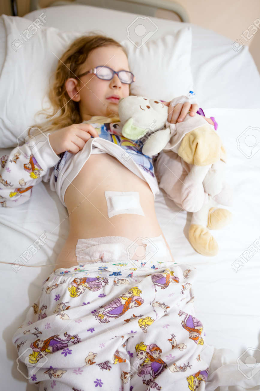 littlegirl belly Little Girl Has Medical Patch On Her Belly And Catheter Tube After Surgical  Operation Of Appendix. Stock Photo, Picture and Royalty Free Image. Image  92168086.
