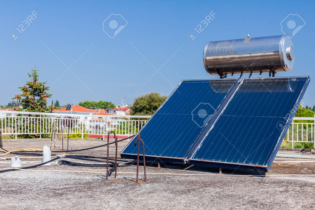 Water Panels For Using Renewable Sun Energy Are Placed On House