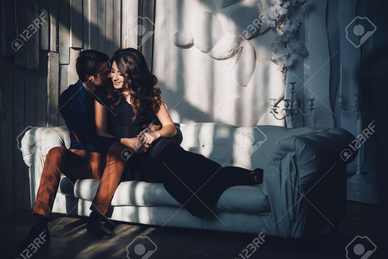 Beautiful Young Couple In Love Hugging. Cute Brunette Girl And Her  Boyfriend Posing. Family Concept Stock Photo, Picture and Royalty Free  Image. Image 70816487., image size:1300x866