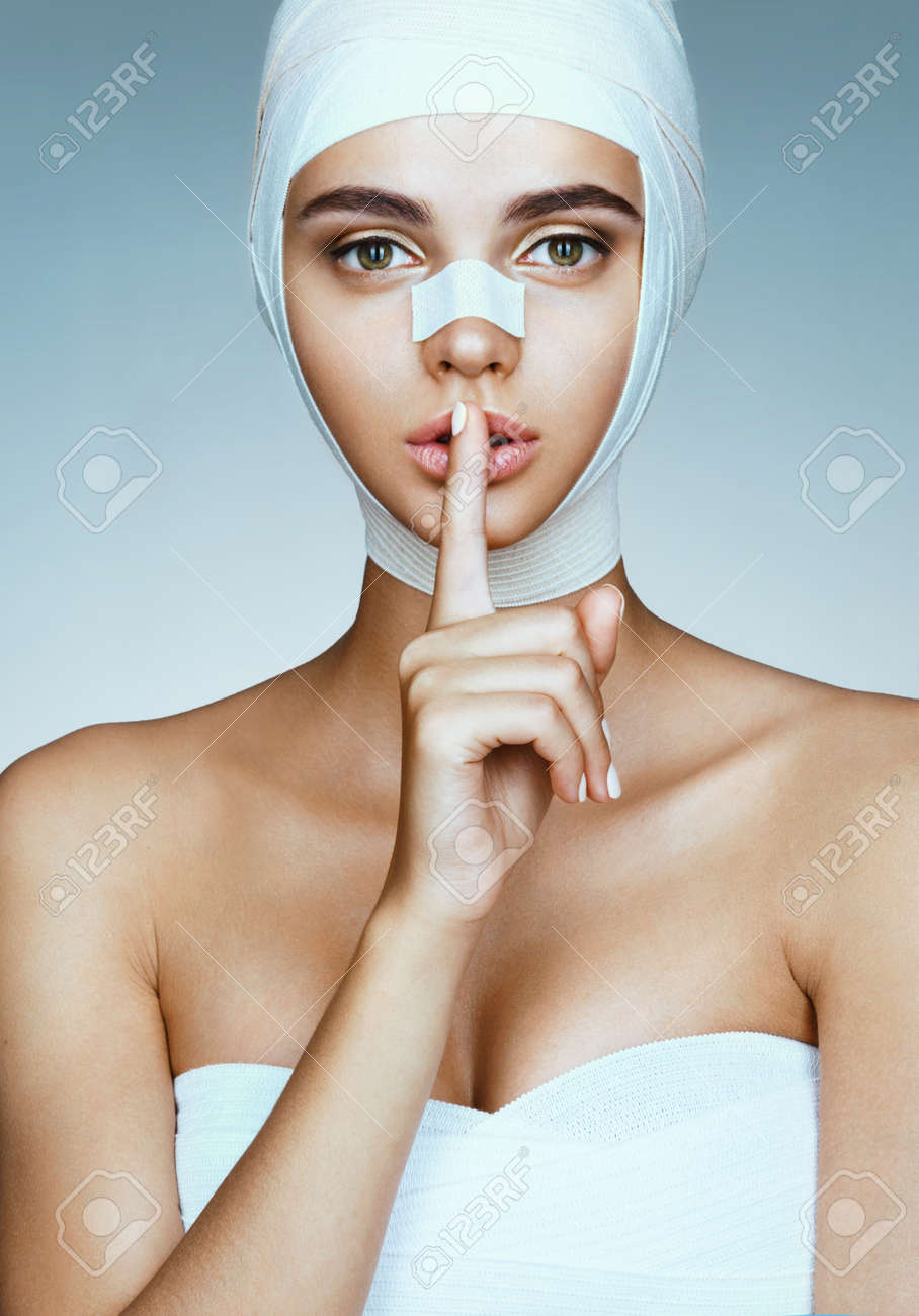 shhh it s a secret girl in medical bandage after operation stock