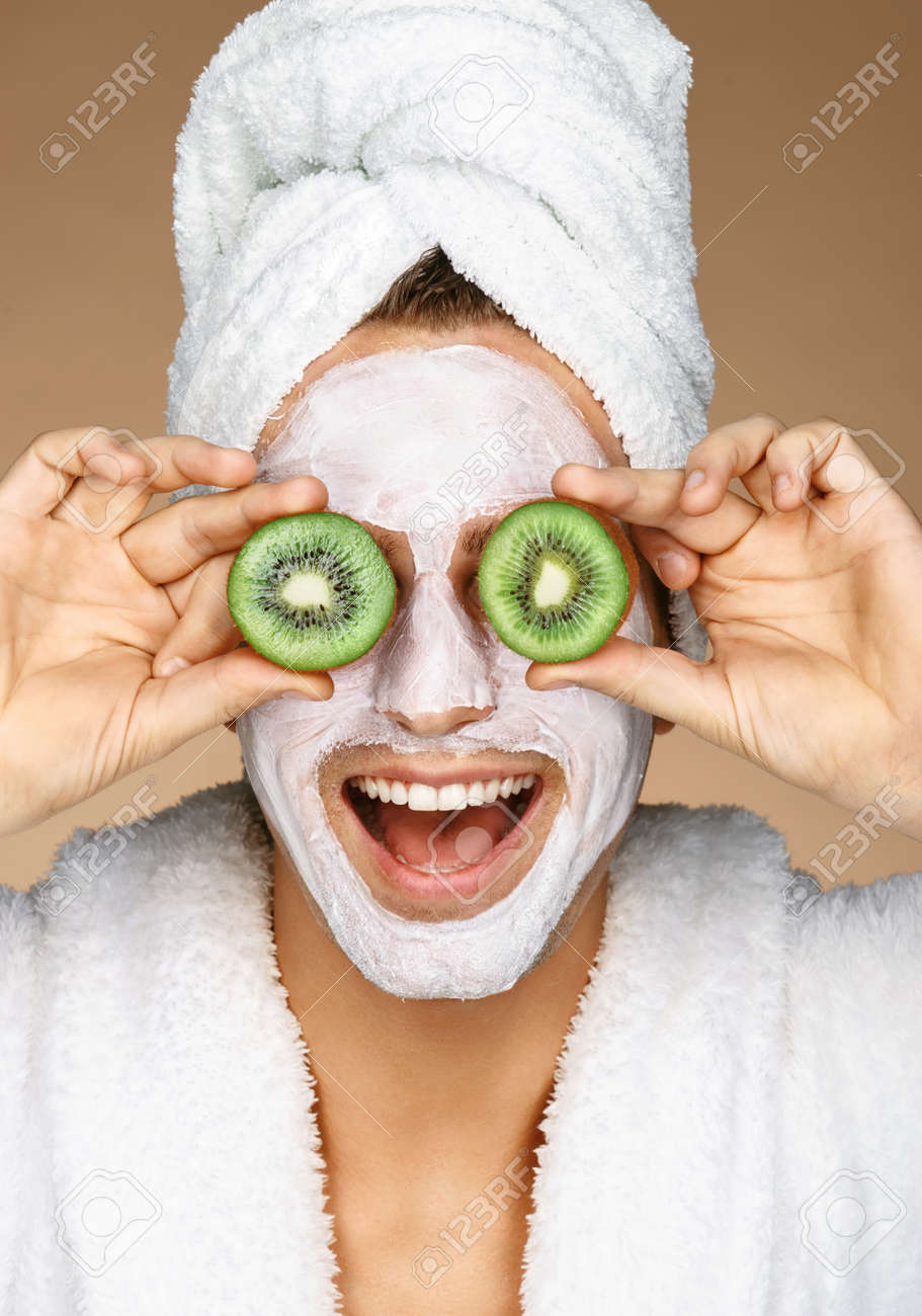 Download Funny Young Man With Facial Mask And Pieces Of Kiwis On Eyes Stock Photo Picture And Royalty Free Image Image 75756532 PSD Mockup Templates