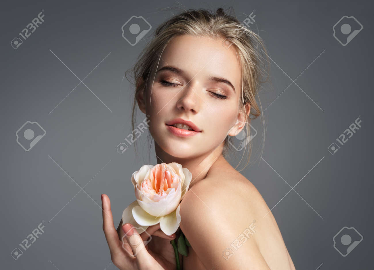 Beautiful girl with closed eyes on grey background. Beauty & Skin care concept - 91242323 Beautiful girl with closed eyes on grey background. Beauty & Skin care concept - 91242323