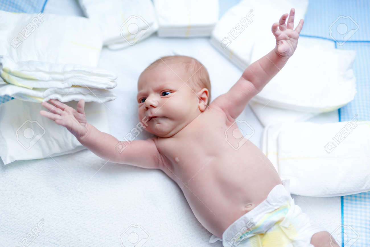 baby on changing table