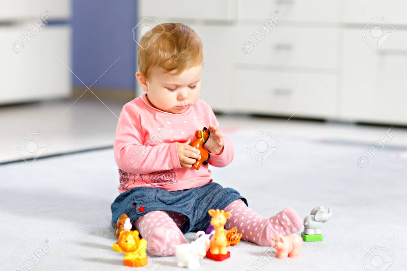 playing with toy animals